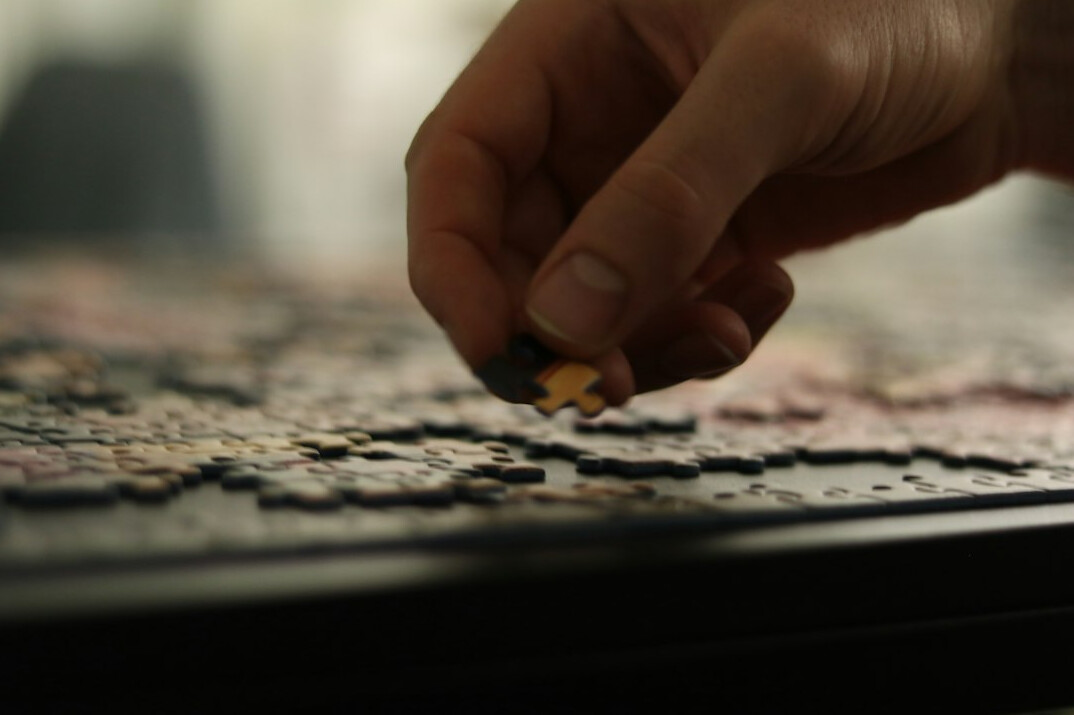person solving puzzle