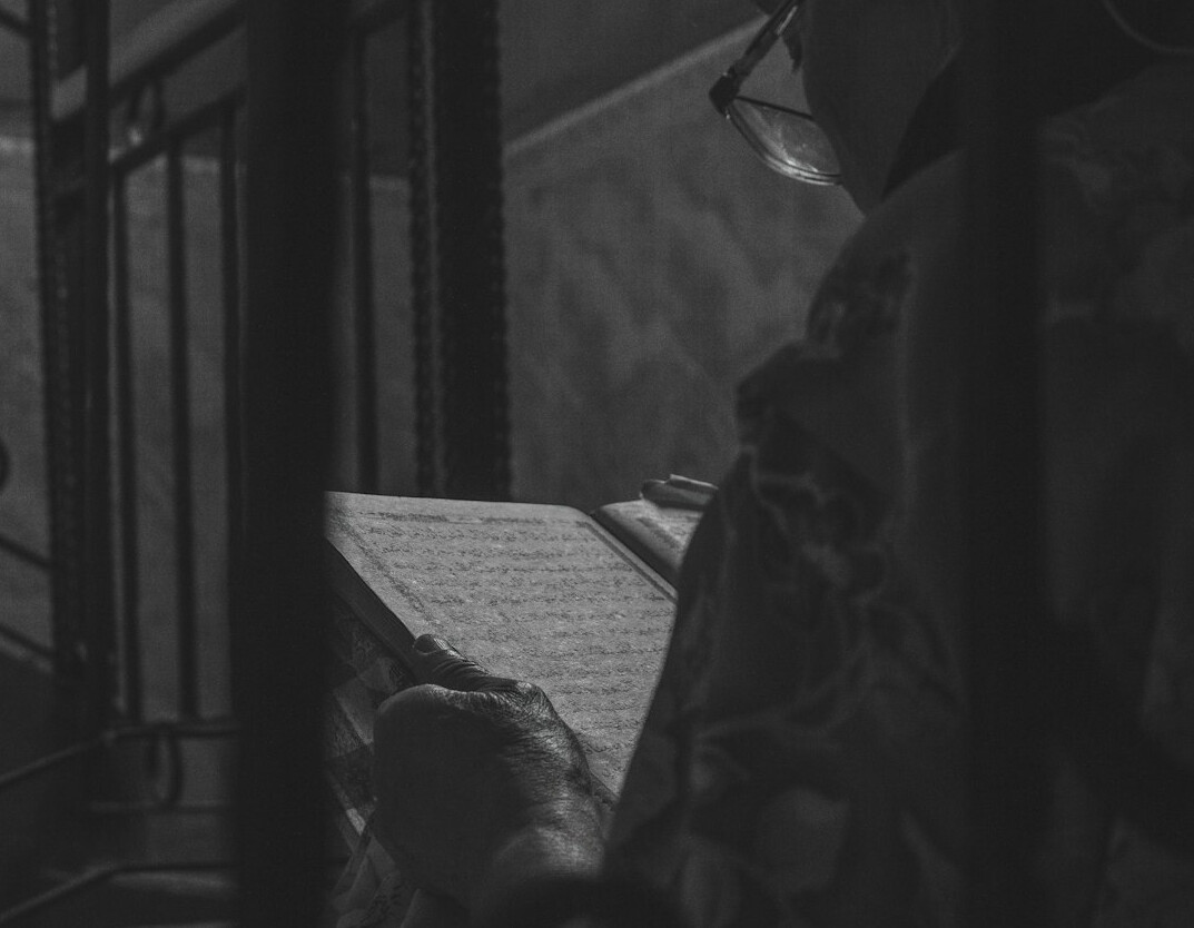 detective reading old book